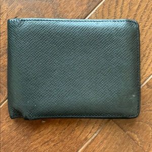 Louis Vuitton black Taiga wallet.